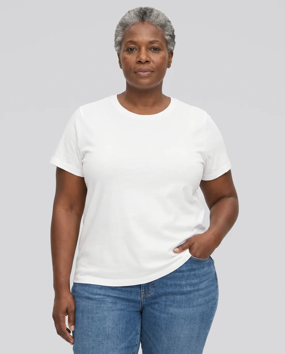 Women's Hybrid Relaxed tee in White, worn in size 2XL